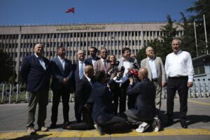 A group of lawmakers from Turkey’s main opposition Republican People’s Party, or CHP, speak to the media after they filed a legal complaint, in Ankara, Turkey, Monday, Aug. 29, 2022, demanding that prosecutors investigate allegations of corruption. A fugitive mafia boss-turned-whistleblower has accused a group of people, including a presidential advisor and a ruling party legislator, of demanding bribes from a businesswoman. (AP Photo/Burhan Ozbilici)