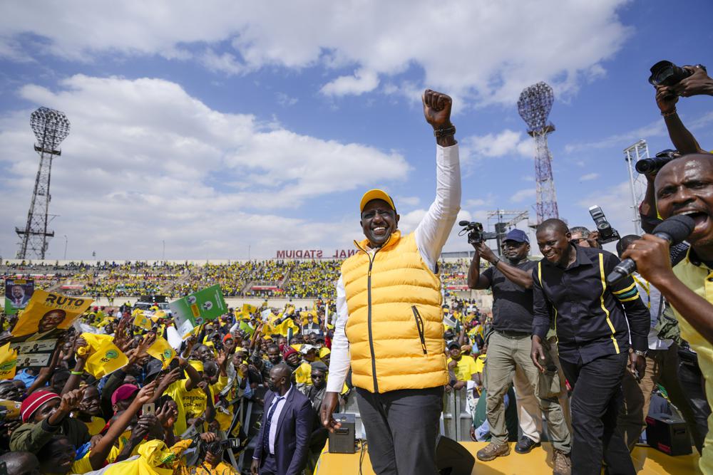 Kenyan presidential candidate William Ruto greets supporters at his final electoral campaign rally at Nyayo stadium in Nairobi, Kenya Saturday, Aug. 6, 2022. Kenya is due to hold its general election on Tuesday, Aug. 9 as the East Africa’s economic hub chooses a successor to President Uhuru Kenyatta. (AP Photo/Ben Curtis)
