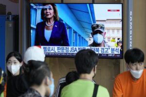 A TV screen shows a news program reporting about U.S. House Speaker Nancy Pelosi was visiting the Joint Security Area of the inter-Korean truce village of Panmunjom, at the Seoul Railway Station in Seoul, South Korea, Friday, Aug. 5, 2022. North Korea on Saturday, Aug. 6, called U.S. House Speaker Pelosi “the worst destroyer of international peace and stability,” accusing her of inciting anti-North Korea sentiment and enraging China during her Asian tour earlier this week.(AP Photo/Ahn Young-joon)