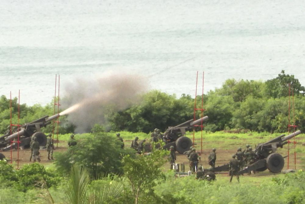 Taiwan’s military conducts artillery live-fire drills at Fangshan township in Pingtung, southern Taiwan, Tuesday, Aug. 9, 2022. Taiwan’s official Central News Agency reported that Taiwan’s army will conduct live-fire artillery drills in southern Pingtung county on Tuesday and Thursday, in response to the Chinese exercises. (AP Photo/Johnson Lai)