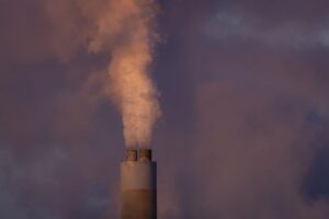 FILE – Carbon dioxide and other pollutants billows from a stack at PacifiCorp’s coal-fired Naughton Power Plant, near where Bill Gates company, TerraPower plans to build an advanced, nontraditional nuclear reactor, Thursday, Jan. 13, 2022, in Kemmerer, Wyo. A major economic bill headed to the president has “game-changing” incentives for the nuclear energy industry, experts say, and those tax credits are even more substantial if a facility is sited in a community where a coal plant is closing. (AP Photo/Natalie Behring, File)