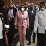 This handout photo taken and released by Malaysia’s Department of Information, U.S. House Speaker Nancy Pelosi, center, tours the parliament house in Kuala Lumpur, Tuesday, Aug. 2, 2022. Pelosi arrived in Malaysia on Tuesday for the second leg of an Asian tour that has been clouded by an expected stop in Taiwan, which would escalate tensions with Beijing. (Malaysia’s Department of Information via AP)