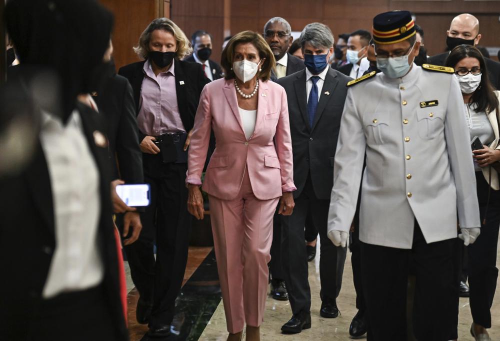 This handout photo taken and released by Malaysia’s Department of Information, U.S. House Speaker Nancy Pelosi, center, tours the parliament house in Kuala Lumpur, Tuesday, Aug. 2, 2022. Pelosi arrived in Malaysia on Tuesday for the second leg of an Asian tour that has been clouded by an expected stop in Taiwan, which would escalate tensions with Beijing. (Malaysia’s Department of Information via AP)