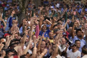 Supporters of Brazil’s former President Luiz Inacio Lula da Silva, who is running for reelection, cheer during a campaign rally outside the Volkswagen automaker´s plant in Sao Bernardo do Campo, greater Sao Paulo area, Brazil, Tuesday, Aug. 16, 2022. Brazil’s general elections are scheduled for Oct. 2, 2022. (AP Photo/Andre Penner)
