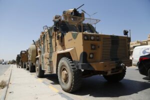 Libyan forces are deployed in Tripoli, Libya, Saturday, Aug. 27, 2022. Clashes broke out early Saturday between rival militias in Libya’s capital, a health official said. (AP Photo/Yousef Murad)