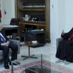 In this photo released by Lebanon’s official government photographer Dalati Nohra, Lebanese president Michel Aoun meets with Lebanese Maronite archbishop Moussa el-Hajj, at the presidential palace, in Baabda east of Beirut, Lebanon, July 22, 2022. The brief detention of el-Hajj who was caught with more than $450,000 in cash as he crossed from Israel to Lebanon is further stoking sectarian tensions in his crisis-hit homeland. (Dalati Nohra via AP)