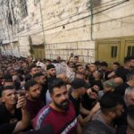 Palestinians carry the body of Islam Sabouh, who was killed during an operation by Israeli forces in the West Bank city of Nablus, Tuesday, Aug. 9, 2022. Israeli police said forces encircled the home of Ibrahim al-Nabulsi, who they say was wanted for a string of shootings in the West Bank earlier this year. They said al-Nabulsi and Sabouh, another Palestinian militant were killed in a shootout at the scene, and that troops found arms and explosives in his home. (AP Photo/Majdi Mohammed)