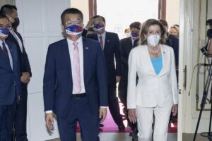 FILE – In this photo released by the Taiwan Legislative Yuan, U.S. House Speaker Nancy Pelosi, right, and Legislative Yuan Deputy Speaker Tsai Chi-chang arrive for a meeting in Taipei, Taiwan, Wednesday, Aug. 3, 2022. China announced Tuesday, Aug. 16, 2022, is imposing visa bans and other sanctions on a number of Taiwanese political figures including Tsai over their promotion of the self-governing island democracy’s independence from Beijing. (Taiwan Presidential Office via AP, File)