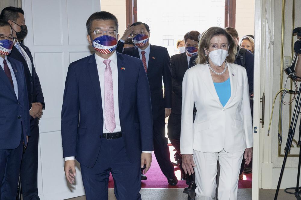 FILE – In this photo released by the Taiwan Legislative Yuan, U.S. House Speaker Nancy Pelosi, right, and Legislative Yuan Deputy Speaker Tsai Chi-chang arrive for a meeting in Taipei, Taiwan, Wednesday, Aug. 3, 2022. China announced Tuesday, Aug. 16, 2022, is imposing visa bans and other sanctions on a number of Taiwanese political figures including Tsai over their promotion of the self-governing island democracy’s independence from Beijing. (Taiwan Presidential Office via AP, File)