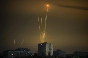 Russian rockets launch against Ukraine from Russia’s Belgorod region are seen at dawn in Kharkiv, Ukraine, early Saturday, Aug. 20, 2022. (AP Photo/Vadim Belikov)