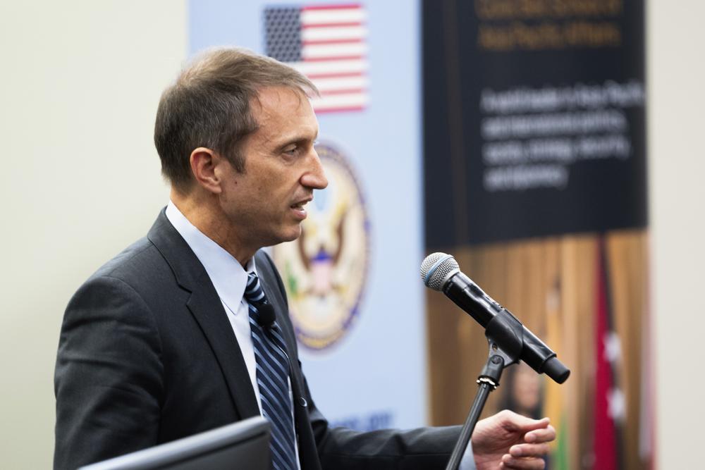 In this photo provided by the Australian National University, U.S. Deputy Special Envoy for Climate Rick Duke speaks at an Australian National University forum, in Canberra, Australia, Thursday, Aug. 25, 2022, after meetings with Australian government officials on bilateral cooperation in transitioning to net-zero greenhouse emissions by 2050. (Tracey Nearmy/Australian National University via AP)