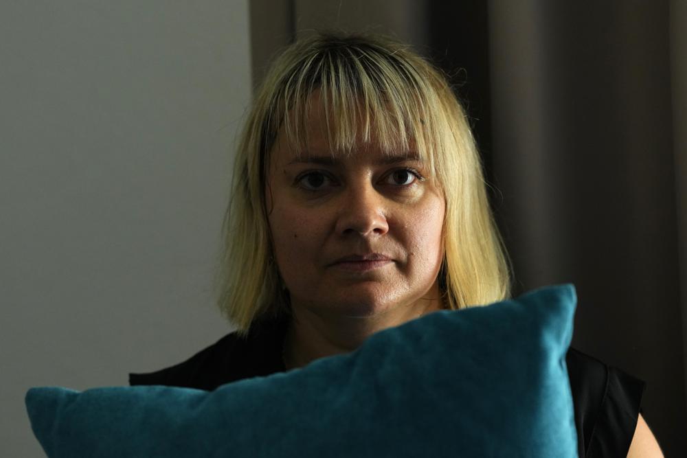 Ukrainian refugee Liudmyla Chudyjovych makes up a room in a hotel where she works, Wednesday, Aug. 3, 2022, in Prague, Czech Republic. Nearly six months after the Russian invasion of Ukraine, many refugees are still struggling to find jobs in their European Union host countries, despite the EU’s streamlined process for Ukrainians to live and work in any of its 27 member nations. (AP Photo/Petr David Josek)