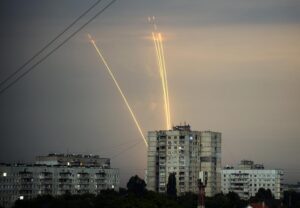 Russian rockets launch against Ukraine from Russia’s Belgorod region are seen at dawn in Kharkiv, Ukraine, Monday, Aug. 15, 2022. (AP Photo/Vadim Belikov)