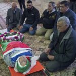 FILE – Mourners pray for 78-year-old Palestinian-American Omar Assad, during his funeral at a mosque, in the West Bank village of Jiljiliya, north of Ramallah, Jan. 13, 2022. Assad died shortly after Israeli soldiers bound and blindfolded him and left him in the cold. In that case, senior officers were reprimanded and stripped of leadership roles. At least 85 Palestinians have been killed in the West Bank this year as Israeli forces have carried out nightly raids in cities, towns and villages, making it the deadliest in the occupied territory since 2016. (AP Photo/Nasser Nasser, File)