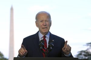 President Joe Biden speaks from the Blue Room Balcony of the White House Monday, Aug. 1, 2022, in Washington, as he announces that a U.S. airstrike killed al-Qaida leader Ayman al-Zawahri in Afghanistan. (Jim Watson/Pool via AP)
