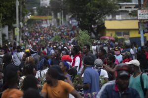 Demonstrators fill the streets during a protest in Port-au-Prince, Haiti, Monday, Aug. 22, 2022. Protesters marched through Haiti’s capital and other major cities, blocking roads and shutting down businesses to demand that Prime Minister Ariel Henry step down and call for a better quality of life. (AP Photo/Odelyn Joseph)