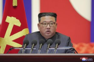 In this photo provided by the North Korean government, North Korean leader Kim Jong Un speaks during a “maximum emergency anti-epidemic campaign meeting” in Pyongyang, North Korea, Wednesday, Aug. 10, 2022. Kim has declared victory over COVID-19 and ordered an easing of preventive measures. Independent journalists were not given access to cover the event depicted in this image distributed by the North Korean government. The content of this image is as provided and cannot be independently verified. Korean language watermark on image as provided by source reads: “KCNA” which is the abbreviation for Korean Central News Agency. (Korean Central News Agency/Korea News Service via AP)
