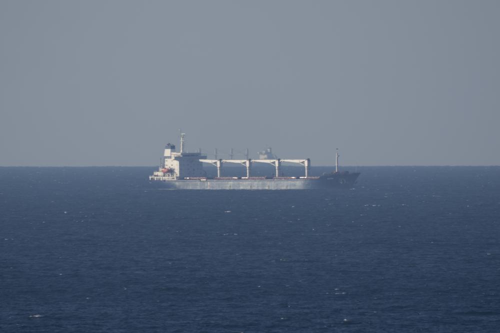 Cargo ship Razoni, arrives to the entrance of the Bosphorus Strait in Istanbul, Turkey, Tuesday, Aug. 2, 2022. Meanwhile, the first cargo ship to leave Ukraine since Russia invaded more than five months ago was off the coast of Bulgaria on Tuesday as it headed toward Istanbul and its final destination, Lebanon, putting to the test an agreement signed last month by Moscow and Kyiv to unblock Ukraine’s agricultural exports and ease the global food crisis. (AP Photo/Khalil Hamra)