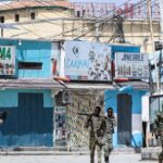 At least 10 killed as gunmen storm hotel in Somali capital
