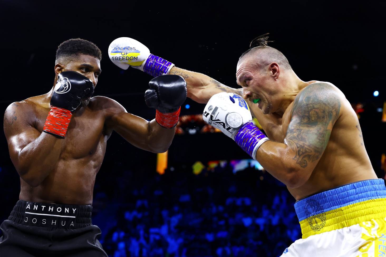 Usyk retains titles after beating Joshua in split decision