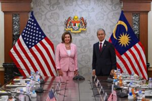 U.S. House of Representatives Speaker Nancy Pelosi and Malaysia’s Parliament Speaker Azhar Azizan Harun pose for photographs during their meeting at Malaysian Houses of Parliament in Kuala Lumpur, Malaysia, August 2, 2022. Malaysian Department of Information/Famer Roheni/Handout via REUTERS