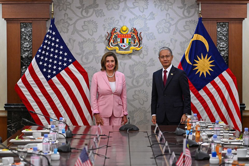 U.S. House of Representatives Speaker Nancy Pelosi and Malaysia’s Parliament Speaker Azhar Azizan Harun pose for photographs during their meeting at Malaysian Houses of Parliament in Kuala Lumpur, Malaysia, August 2, 2022. Malaysian Department of Information/Famer Roheni/Handout via REUTERS