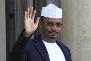FILE – Chad’s Gen. Mahamat Idriss Deby, the head of its military government, waves as he is welcomed by French President Emmanuel Macron for a meeting at the Elysee Palace in Paris, Friday, Nov. 12, 2021. Deby met Saturday, Aug. 6, 2022, with the ruling emir of Qatar after months of talks over a possible peace deal between his forces and rebel factions in the African nation, negotiations hosted by Doha. (AP Photo/Michel Euler, File)