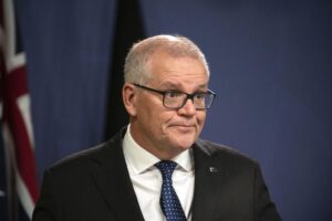 Former Australian Prime Minister Scott Morrison speaks during a news conference in Sydney, Wednesday, Aug. 17, 2022. Morrison defends his decision to secretly appoint himself to five ministerial roles when he was Australia’s prime minister, saying it was a necessary step during the depths of the coronavirus crisis. (AAP Image/Flavio Brancaleone)