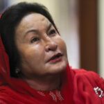 FILE – Rosmah Mansor, wife of former Malaysian Prime Minister Najib Razak, arrives at Kuala Lumpur High Court in Kuala Lumpur, Malaysia, on June 18, 2019. Malaysia’s top court on Saturday, Aug. 27, 2022, condemned as a smear attempt the leaking of what was described as a guilty verdict against Rosmah Mansor, the wife of jailed former Prime Minister Najib Razak, at her trial over alleged bribes for a solar energy project. (AP Photo/Vincent Thian, File)