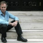 FILE – Author Nicholas Evans poses in New York Sept. 29, 2005. Evans, the British author of the bestselling novel “The Horse Whisperer,” has died at 72. His representatives at United Agents said Evans died “suddenly” on Aug. 9, 2022 following a heart attack. Published in 1995, “The Horse Whisperer” was Evans’ debut novel and sold more than 15 million copies worldwide. The story of a trainer hired to help an injured teenager and her horse back to health was adapted into a Hollywood movie starring Robert Redford as the title character and Scarlett Johansson playing the young rider in her breakout role. (AP Photo/Tina Fineberg, File)