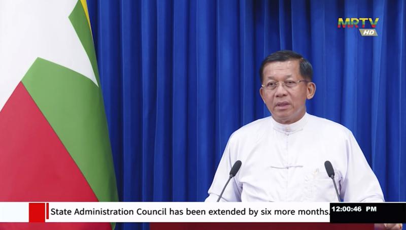 In this image from video by Myanmar state broadcaster MRTV, Senior General Min Aung Hlaing, head of the ruling State Administration Council, delivers a broadcast speech Monday, Aug. 1 2022. The leader of Myanmar’s military-installed government has announced the extension of its mandate to rule for another six months in preparation for an election it has said will be held next year. (MRTV via AP)