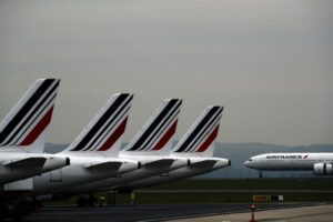 FILE – Air France planes are parked on the tarmac at Paris Charles de Gaulle airport, in Roissy, near Paris, May 17, 2019. Air France pilots are under scrutiny after recent incidents that have prompted French investigators to call for tougher safety protocols. An airline official said two Air France pilots were suspended after physically fighting in the cockpit on a Geneva-Paris flight in June, 2022. (AP Photo/Christophe Ena, File)