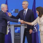 FILE – Finland’s Foreign Minister Pekka Haavisto, left, Sweden’s Foreign Minister Ann Linde, right, and NATO Secretary General Jens Stoltenberg attend a media conference after the signature of the NATO Accession Protocols for Finland and Sweden in the NATO headquarters in Brussels, July 5, 2022. (AP Photo/Olivier Matthys, File)