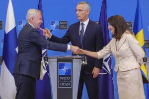 FILE – Finland’s Foreign Minister Pekka Haavisto, left, Sweden’s Foreign Minister Ann Linde, right, and NATO Secretary General Jens Stoltenberg attend a media conference after the signature of the NATO Accession Protocols for Finland and Sweden in the NATO headquarters in Brussels, July 5, 2022. (AP Photo/Olivier Matthys, File)