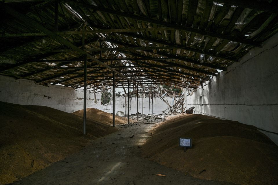 Wheat grains are seen inside a storage damaged by a Russian missile strike, as Russia’s attack on Ukraine continues, in Zaporizhzhia Region, Ukraine August 5, 2022. REUTERS/Dmytro Smolienko/File Photo