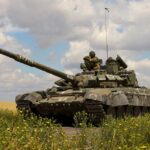 A tank of Russian troops drives in Russian-held part of Zaporizhzhia region, Ukraine, July 23, 2022. REUTERS/Alexander Ermochenko/File Photo
