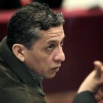 Antauro Humala, former Army major and brother of Peru’s President Ollanta Huamala, talks with his lawyer in a courtroom at Callao’s Naval Base in Lima, September 18, 2012. REUTERS/Enrique Castro-Mendivil