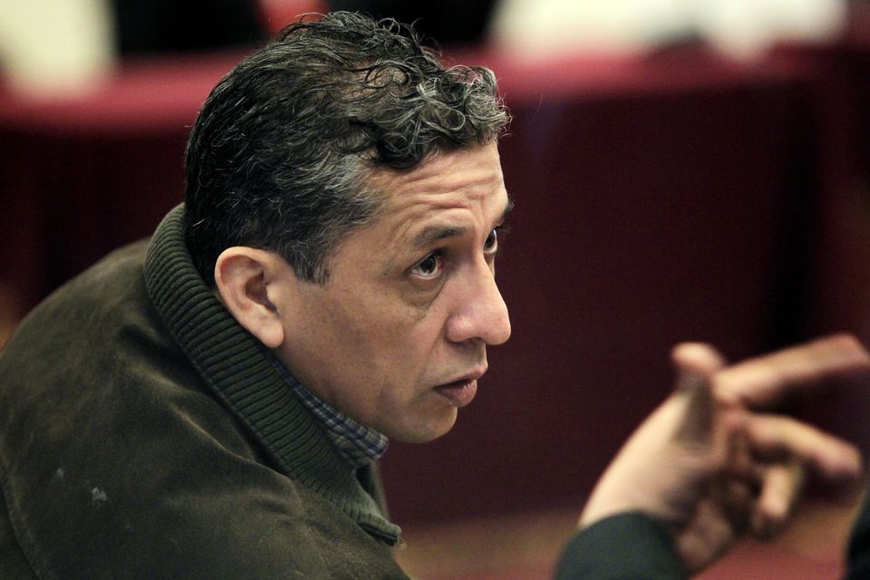Antauro Humala, former Army major and brother of Peru’s President Ollanta Huamala, talks with his lawyer in a courtroom at Callao’s Naval Base in Lima, September 18, 2012. REUTERS/Enrique Castro-Mendivil