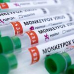Test tubes labeled “Monkeypox virus positive and negative” are seen in this illustration taken May 23, 2022. REUTERS/Dado Ruvic/Illustration/File Photo