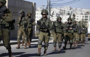 Gaza ceasefire talks between Israel, militants hold, crossings reopen