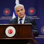Israel’s Foreign Minister Yair Lapid speaks during a news conference as he meets Turkey’s Foreign Minister Mevlut Cavusoglu in Ankara, Turkey June 23, 2022. REUTERS/Umit Bektas/File Photo