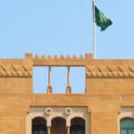 A Saudi flag flutters atop the Saudi Arabia’s embassy in Beirut, Lebanon May 18, 2022. REUTERS/Mohamed Azakir