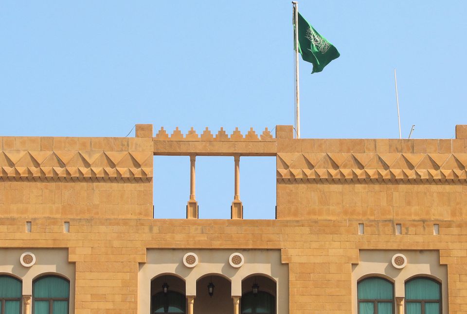 A Saudi flag flutters atop the Saudi Arabia’s embassy in Beirut, Lebanon May 18, 2022. REUTERS/Mohamed Azakir