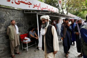 Families of victims of last night’s explosion wait in front of an emergency hospital in Kabul, Afghanistan August 18, 2022. REUTERS/Ali Khara