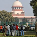 Television journalists are seen outside the premises of the Supreme Court in New Delhi, India, January 22, 2020. REUTERS/Anushree Fadnavis