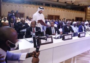 Officials attend a signing agreement for a national dialogue with Chad’s transitional military authorities and rebels at Sheraton Hotel in Doha, Qatar August 8, 2022. REUTERS/Ibraheem Al Omari/File Photo