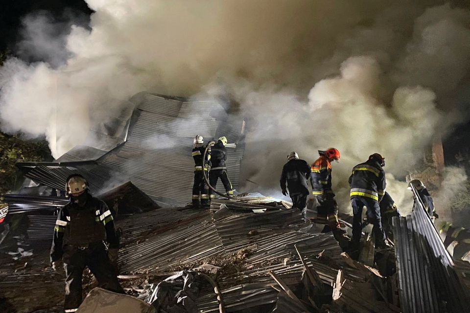 Rescuers work at the site of a residential building destroyed by a Russian missile strike, amid Russia’s attack on Ukraine, in Kharkiv, Ukraine August 17, 2022. REUTERS/Vitalii Hnidyi