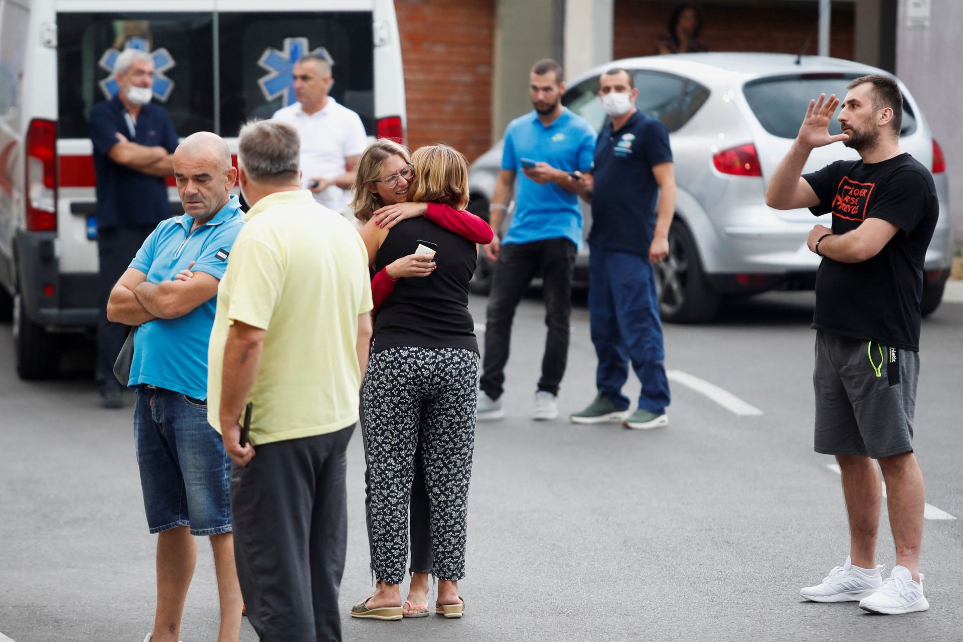 Relatives of victims wait in front of a city hospital after a mass shooting, in Cetinje, Montenegro August 12, 2022. REUTERS/Stevo Vasiljevic