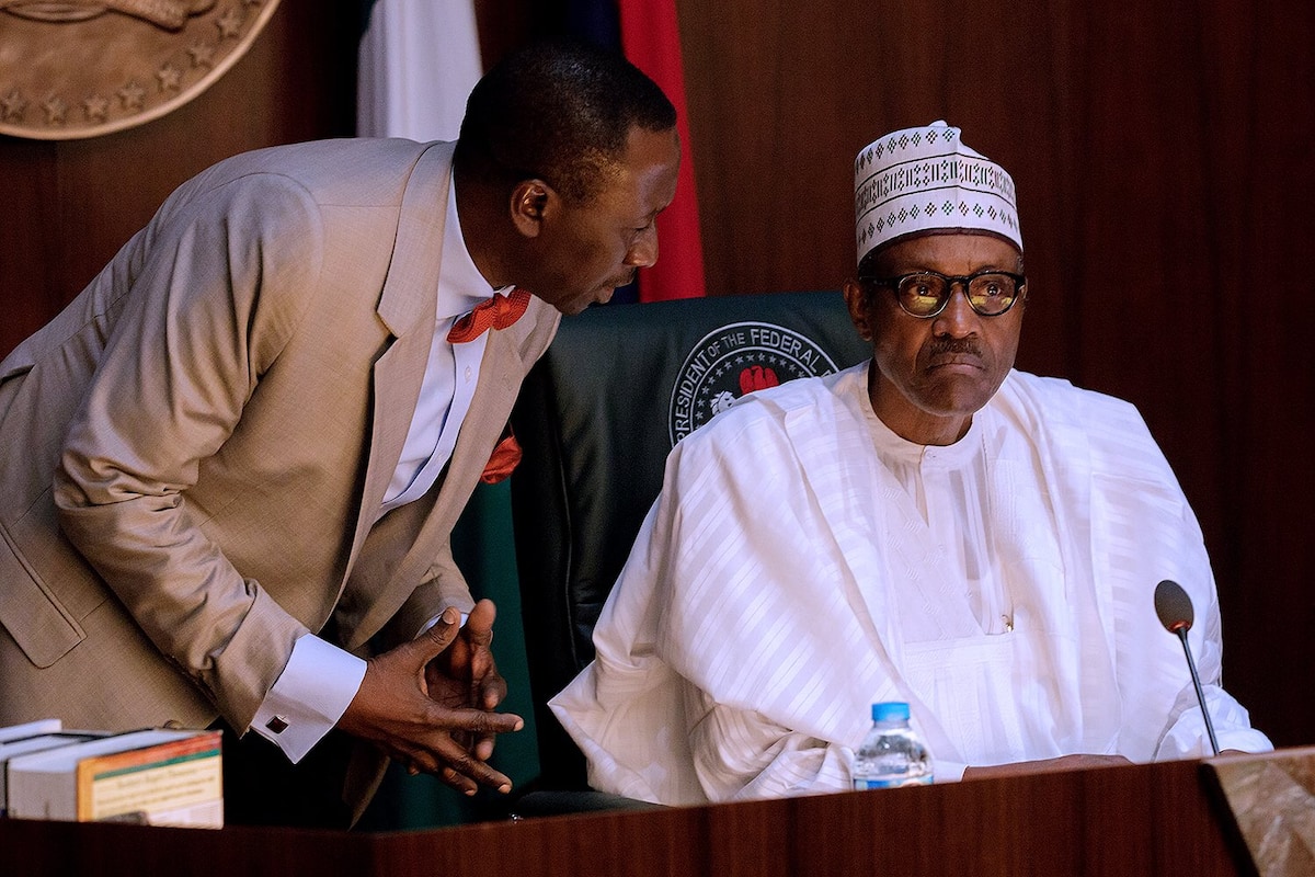 NSA Babagana Monguno (L), President Muhammadu Buhari (R)