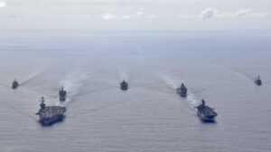 us_navy_ships_transit_the_philippine_sea_march_24_2020._reuters